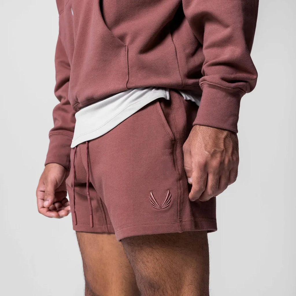 Pantalones cortos para hombre con logo bordado.