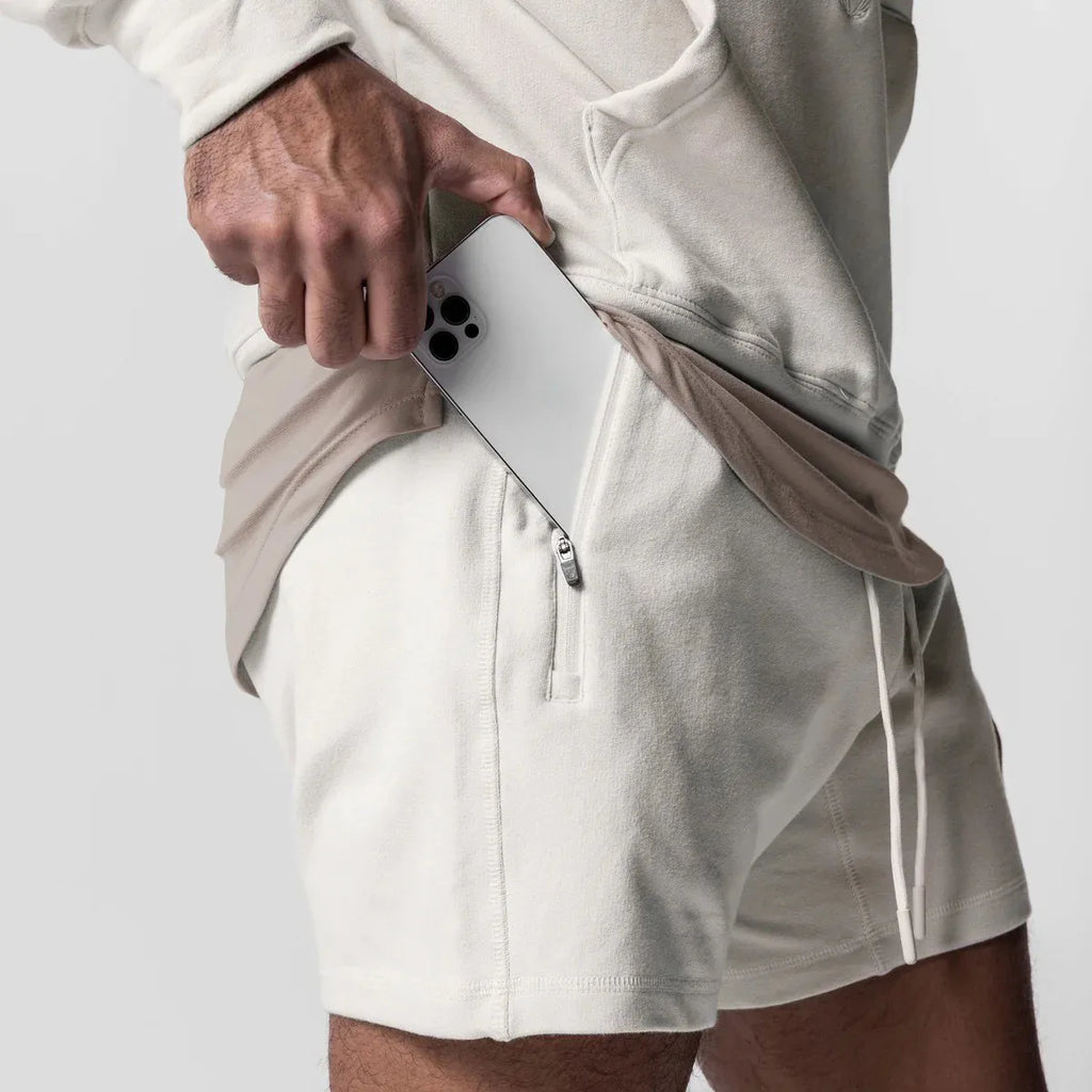 Pantalones cortos para hombre con logo bordado.