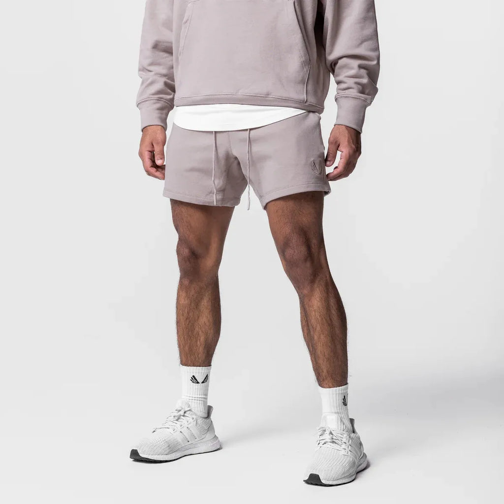 Pantalones cortos para hombre con logo bordado.