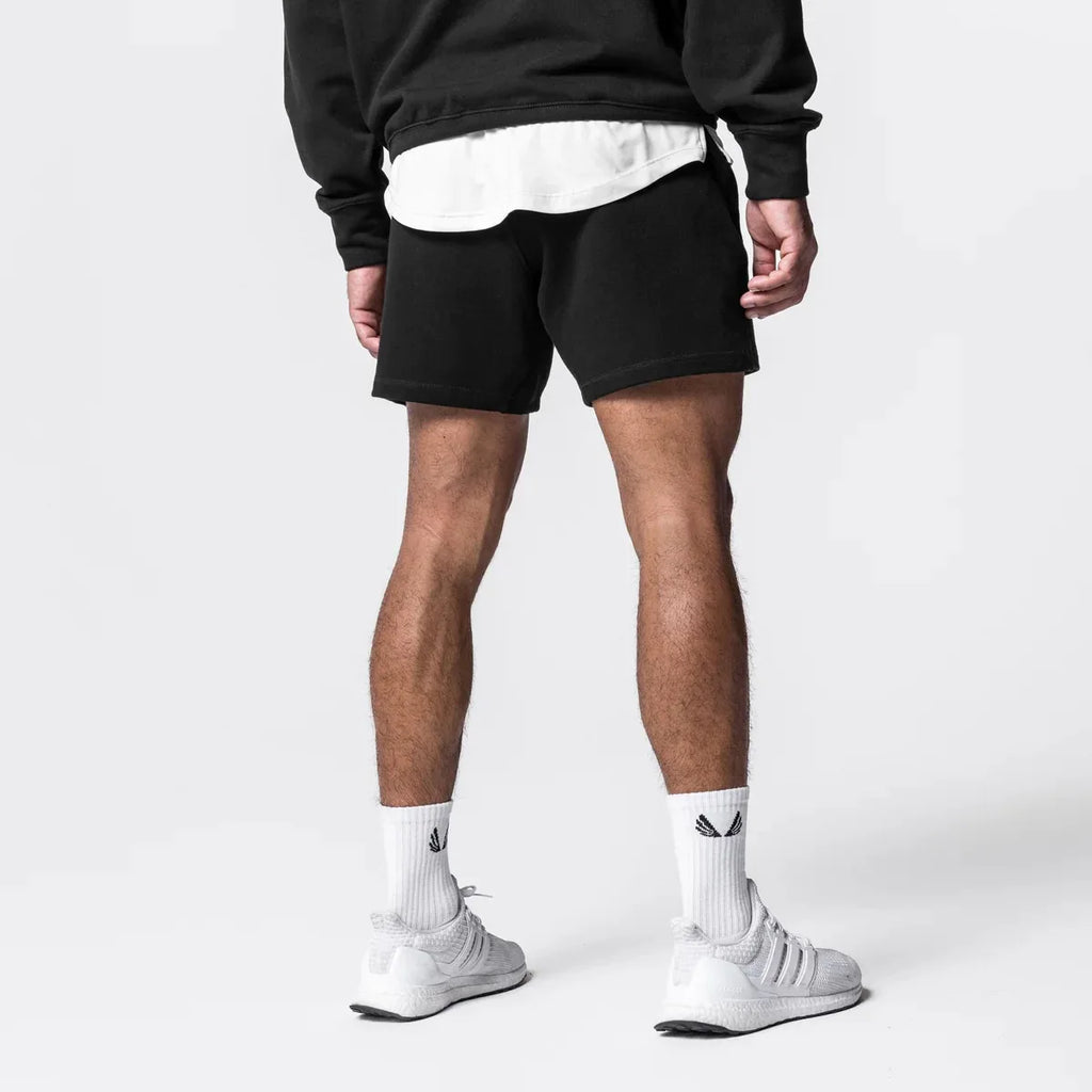 Pantalones cortos para hombre con logo bordado.